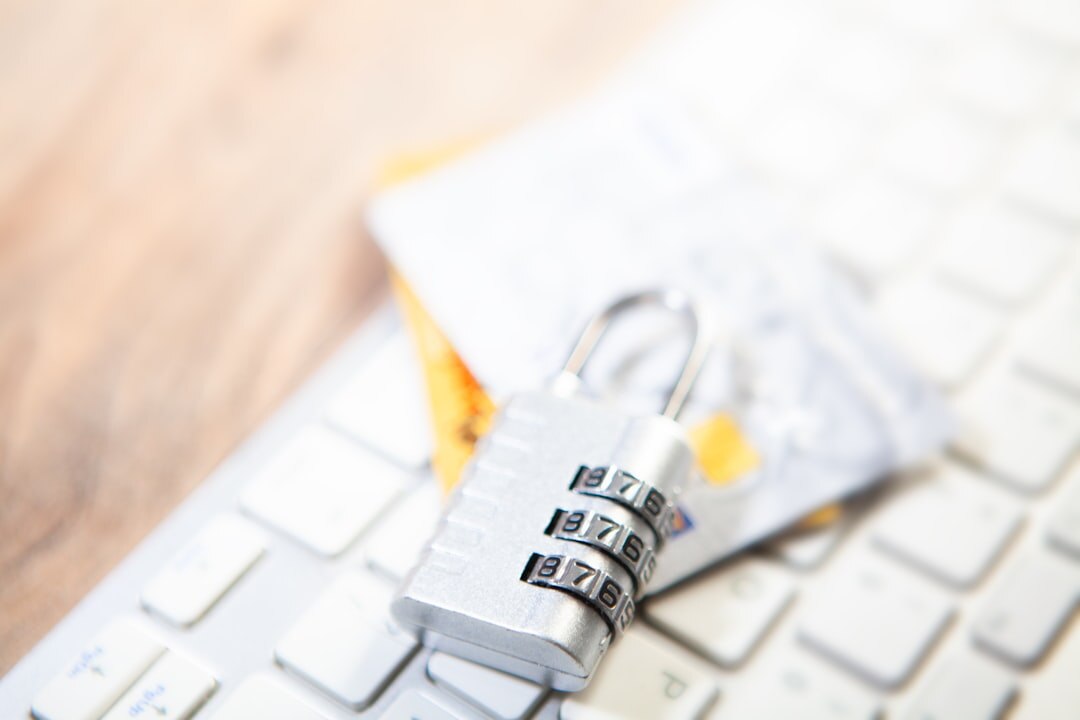 Cybersecurity digital lock with code in the background