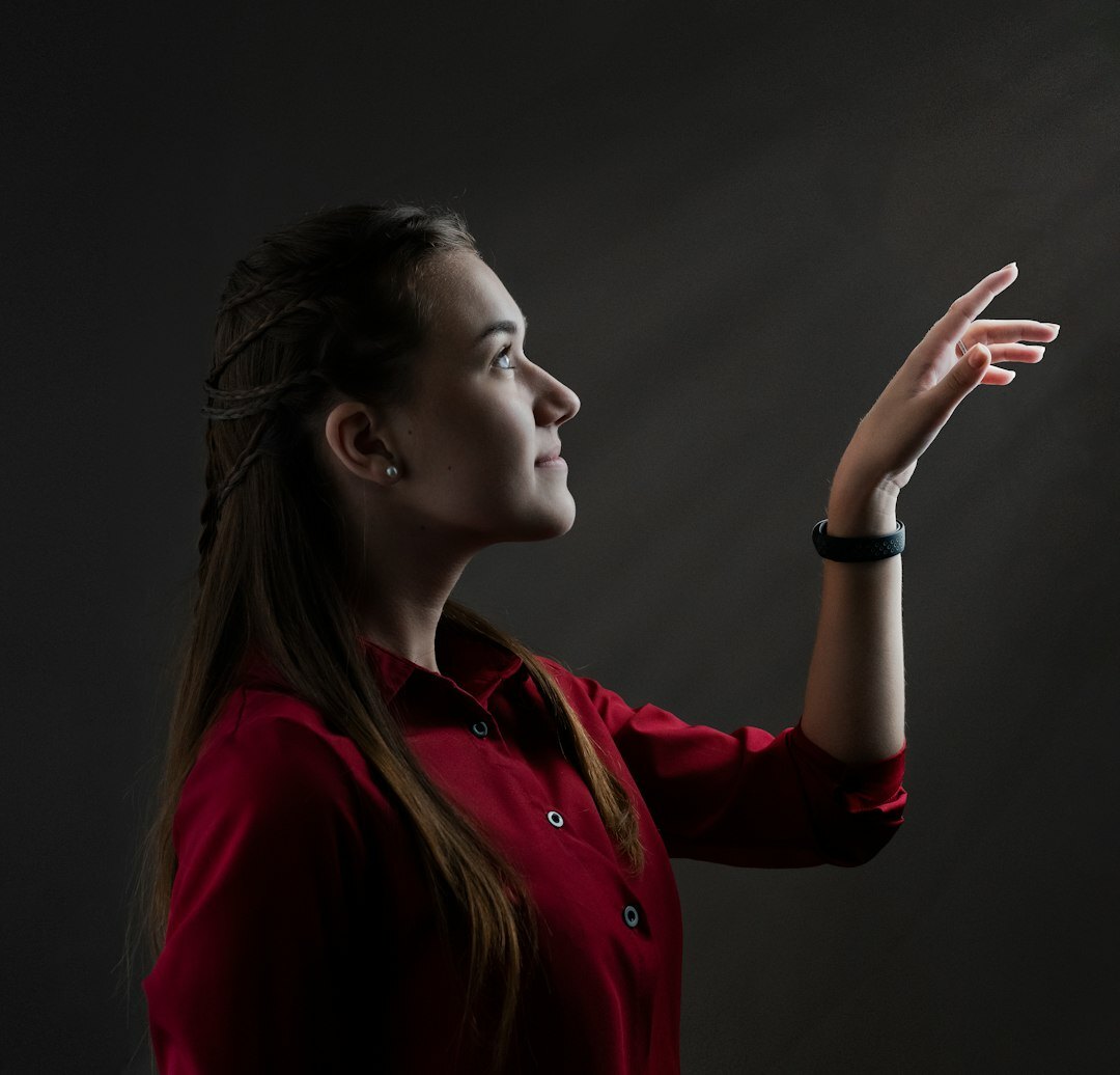Professional Belgian female technology analyst with glasses