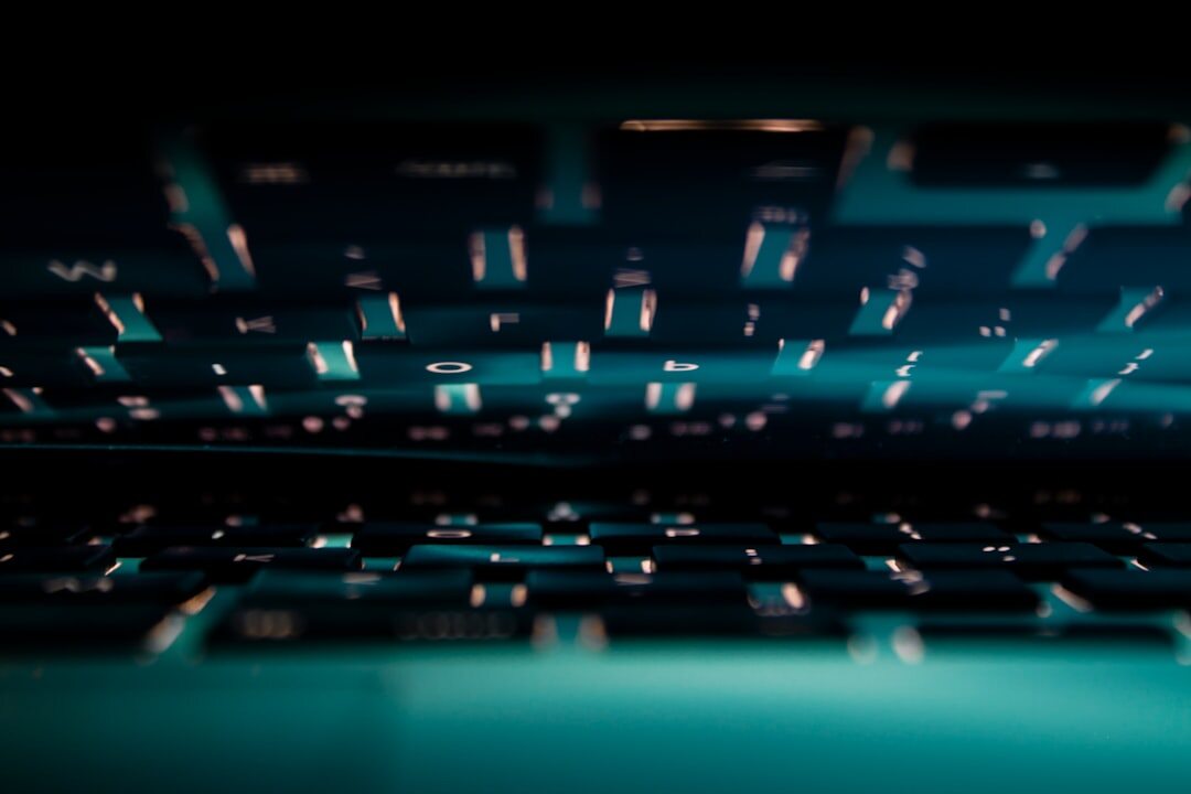 Modern laptop with futuristic technology display on dark background