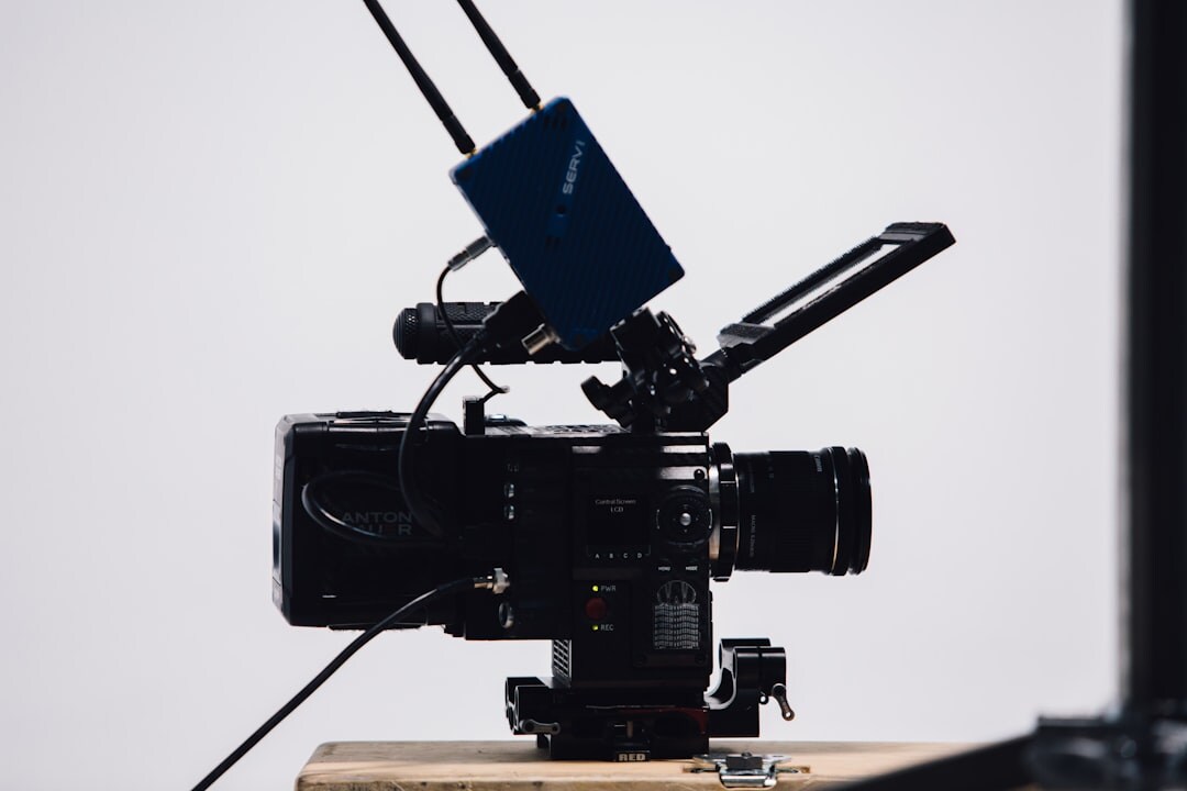 Professional video camera and production equipment on a table