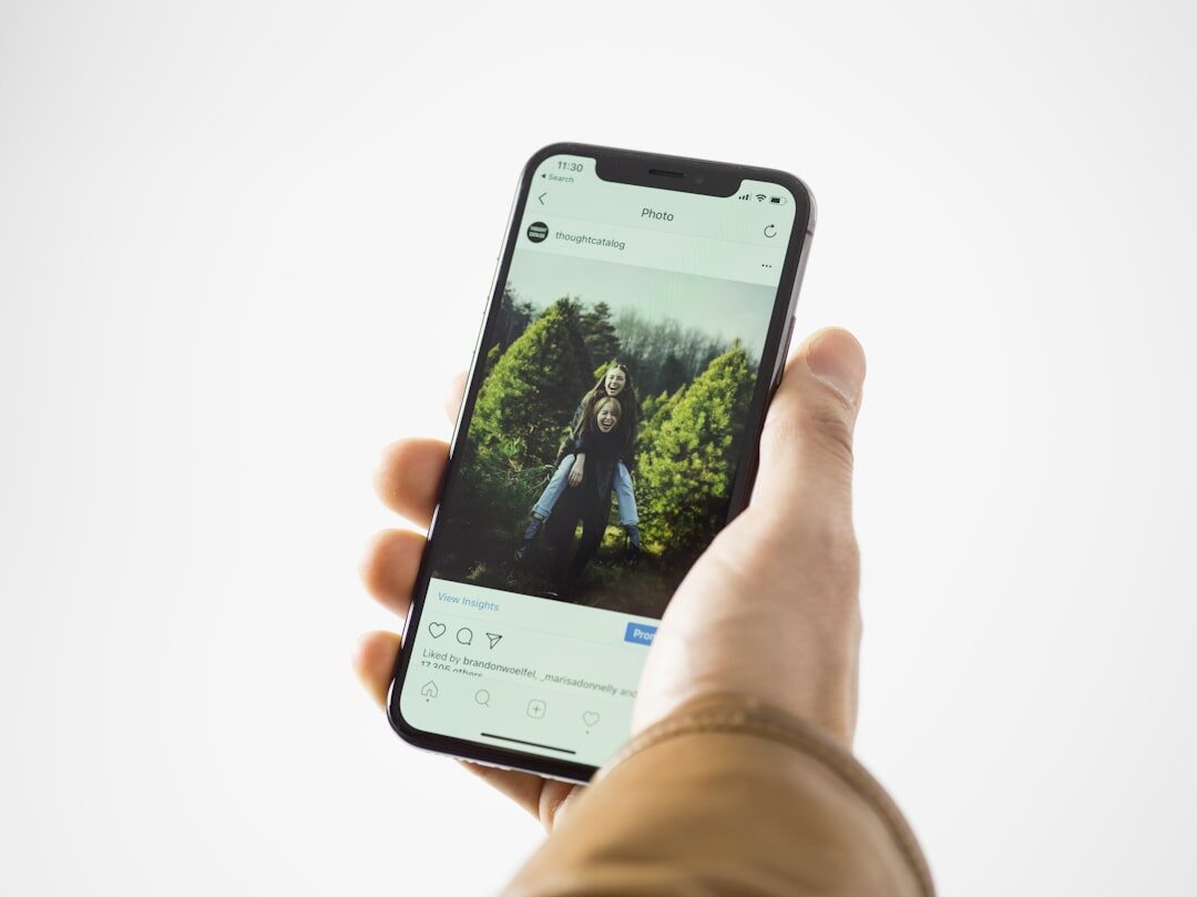 Smartphone displaying a social media news feed