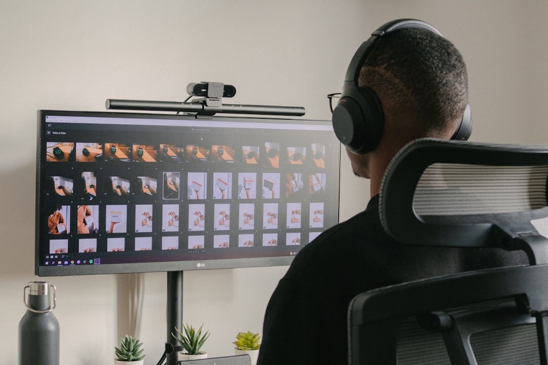 Video editor working on footage timeline on a computer monitor